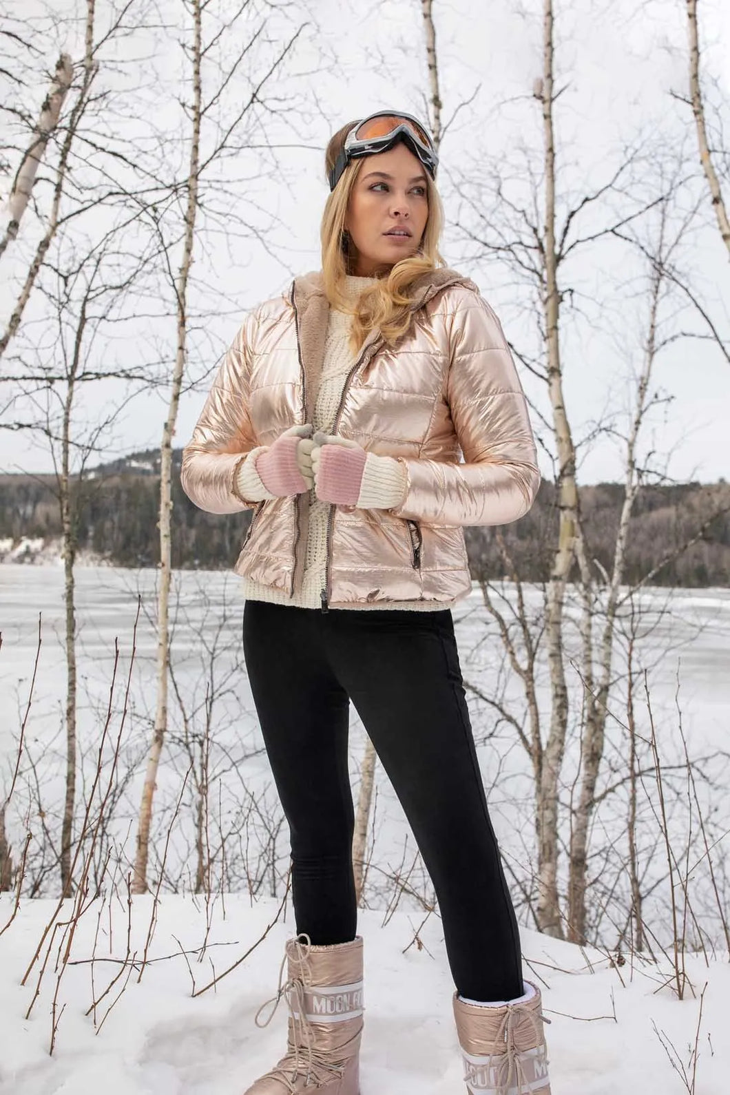 Fashion choices can be tough, but this jacket lets you have it all. We love this versatile puffer thanks to its classic zippered front, cozy hood, zippered front pockets, and soft polyfill inner, but the real treat is the reversible metallic shell that lets you choose your own style adventure and create a look that's uniquely yours.  Color- Metallic champagne. Zip front with hood. Relaxed fit. Reversible. Front zippered pockets.