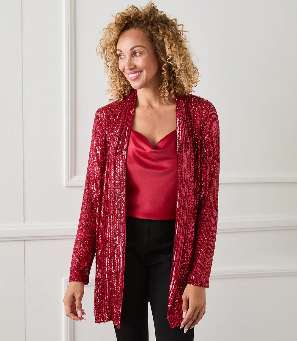 Be event ready with this light-catching sequin duster. Sparkle and sophistication provide evening allure to this jacket. Pair it with black slacks for a polished evening look.