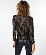 Load image into Gallery viewer, Shine and sparkle at your next event with this stunning sequin wrap over top. Just the perfect amount of stretch creates a comfortable fit.  A beautiful style, our Sabine pairs perfectly with black pants. Combine with a pair of black faux leather pants and heels and you are party ready.  Color- Black and bronze. Wrap over style. V-neck. Fabric- 100% Polyester.
