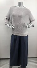 Load image into Gallery viewer, A perfect sweater for all year round, as it is not too heavy and not too light, this knit sweater is fashionable and functional.  The silver-gray color is so on trend and literally goes with so many different bottoms.  As this 3/4 sleeve sweater is not a tight knit, it is slightly see-through.  Wear over a bralette, tank or nude bra if preferred.  
