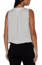 Load image into Gallery viewer, This classic dot printed top features a draped front for the most flattering fit.  The V-neck design elevates the look of this lovely sleeveless top.  A perfect top to match with so many different bottoms from jeans to dress pants.  Create the perfect outfit when paired with our Black Sena Boyfriend Blazer with Princess Seams by Liverpool LA and our Black Kelsey Knit Trouser by Liverpool LA.
