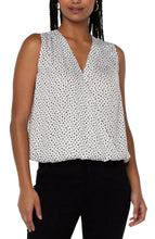 Load image into Gallery viewer, This classic dot printed top features a draped front for the most flattering fit.  The V-neck design elevates the look of this lovely sleeveless top.  A perfect top to match with so many different bottoms from jeans to dress pants.  Create the perfect outfit when paired with our Black Sena Boyfriend Blazer with Princess Seams by Liverpool LA and our Black Kelsey Knit Trouser by Liverpool LA.
