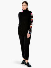 Load image into Gallery viewer, Striped sleeves on our Sena turtleneck create a dramatic look that will turn heads. Other extraordinary details add even greater interest including color patches at the hem and turtleneck. The bright vivid colors on this fabulous sweater will make you happy every time you wear it.  Colors- Black multi- blue, white, pink ,orange, tan. Pullover sweater. Knit in squares detail. Regular fit. Turtleneck. Long sleeve
