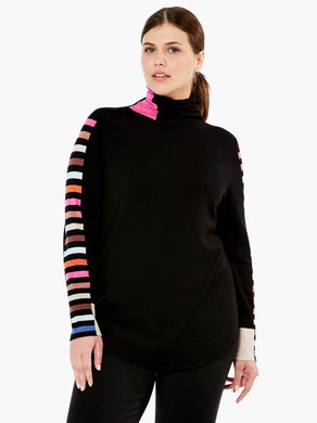 Striped sleeves on our Sena turtleneck create a dramatic look that will turn heads. Other extraordinary details add even greater interest including color patches at the hem and turtleneck. The bright vivid colors on this fabulous sweater will make you happy every time you wear it.  Colors- Black multi- blue, white, pink ,orange, tan. Pullover sweater. Knit in squares detail. Regular fit. Turtleneck. Long sleeve