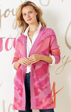 The Sun Chaser Cardigan sweater features an artistic, one-of-a-kind jacquard knit with colors that are joyful, bright and expressive. This cozy cardigan is designed with a soft, midweight yarn which has an easy, relaxed fit.   Color- Multi pink. Cardigan sweater with open front. Jacquard knit with original artwork. Midweight. Relaxed fit. Shawl collar.