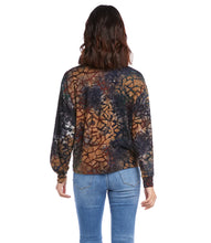 Load image into Gallery viewer, Textural beauty defines this multi-dimensional top covered with an alluring abstract tie-dye design. It&#39;s finished with stylish tie-front. This top pairs perfectly with your favorite denim. Color-Multi-Tan, Blue, Rust. Long sleeve. Crew neck. Unique dye treatment used, color &amp; design may vary.
