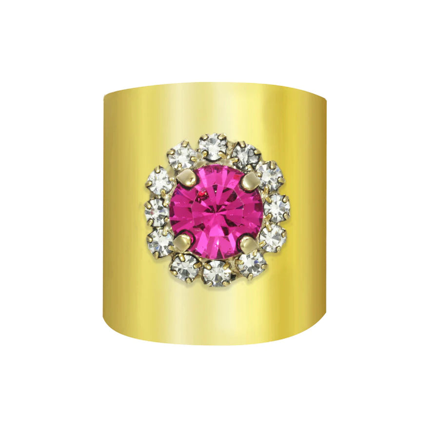 A lovely addition to your jewelry collection, the Vida Fuchsia Ring is just the piece you need to add a bit of drama to your outfit. A beautiful fuchsia color Swarovski stone surrounded by crystals, sits atop a dramatic adjustable gold band.