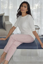 Load image into Gallery viewer, Unique as it is beautiful, our Wiola is designed with a textured knit and gold metallic detailing around the neckline and sleeves. This pullover top is easy to wear and catches the eye with its details.  This top is a must for your wardrobe as it goes with so many of your favorite bottoms. Colors- Off-White and gold. Pull-over.
