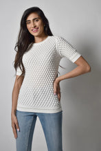 Load image into Gallery viewer, Unique as it is beautiful, our Wiola is designed with a textured knit and gold metallic detailing around the neckline and sleeves. This pullover top is easy to wear and catches the eye with its details.  This top is a must for your wardrobe as it goes with so many of your favorite bottoms. Colors- Off-White and gold. Pull-over.
