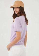 Load image into Gallery viewer, A gorgeous wild pansy color, our Shana lightweight sweater is a perfect piece for all seasons.  You can style alone or pair with our Lucia Long Sleeve Cardigan in the same color for the perfect look.  Color- Wild Pansy; lilac. Short sleeve. Lightweight sweater fabrication.
